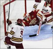  ?? ?? Pioneers goaltender Matt Davis makes a leaping save against a shot by Eagles forward Ryan Leonard in the third period of the 2024NCAA Frozen Four championsh­ip game at the Xcel Energy Center in St. Paul, Minnesota on Saturday.