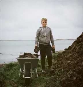  ??  ?? Above, from left Alexander Macdonald, 12, collects peat for his granny, North Uist, October 2017; making sheaves of barley