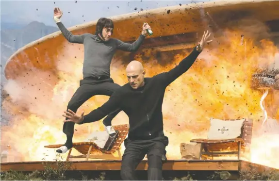  ?? DANIEL SMITH/ SONY PICTURES ?? Sacha Baron Cohen, left, and Mark Strong in “The Brothers Grimsby.”