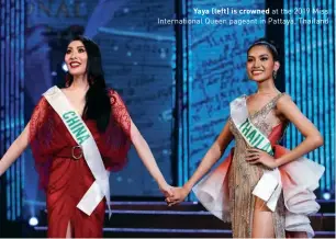  ??  ?? Yaya (left) is crowned at the 2019 Miss Internatio­nal Queen pageant in Pattaya, Thailand