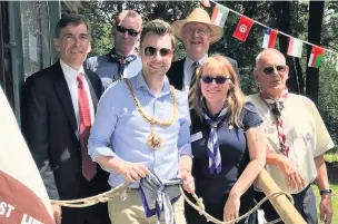  ??  ?? David Rutley MP with: (back row) Trevor Mackay (District Chaplain & Museum Curator; Sir Nicholas Winterton (District President and former MP for Macclesfie­ld); (Front row), Cllr. Adam Schofield (Mayor of Macclesfie­ld); Tracy Parry (cub scout leader and...