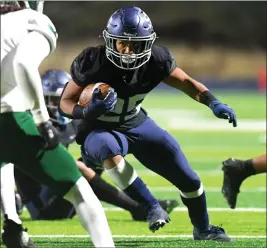  ?? PHOTO BY ANDY HOLZMAN ?? Sierra Canyon's Dane Dunn, shown rushing against Inglewood in the CIF-SS Division 2 final Saturday, was named Mission League MVP after amassing 1,815yards and 23TDs.