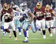  ?? AP/RON JENKINS ?? Dallas Cowboys wide receiver Amari Cooper runs away from Washington Redskins defenders on a 40-yard touchdown reception Thursday. Cooper had 8 catches for 180 yards and 2 touchdowns in the Cowboys’ victory.