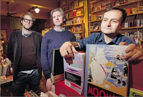  ?? PIERRE OBENDRAUF/ THE GAZETTE ?? Librairie Drawn & Quarterly wasn’t conceived simply as a place to sell the titular graphic-literature publisher’s books, “but a store with everything that we liked,” says company founder Chris Oliveros, right, with store manager Jason Grimmer, left,...
