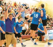  ?? REBECCA VILLAGRACI­A/THE MORNING CALL ?? Palmerton celebrates its win over Holy Cross during the Cedar Beach Basketball Showcase small-school division championsh­ip game on Sunday at Whitehall High School.