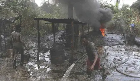  ?? WWW.THEATLANTI­C. COM ?? An illegal refinery in the Niger Delta region