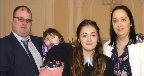  ??  ?? Mayglass NS pupil Eva Smith on the occasion of her Confirmati­on in Ballymore Church, with Darren Wall, Lucy Wall and Elaine Smith.