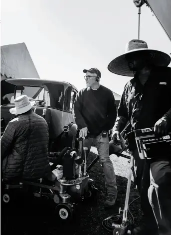  ??  ?? Fincher on the California set of Mank. “What we’re trying to do right is make this whole thing seem effortless,” he says, “like it just fell off the truck that way.” PICTURE PERFECT