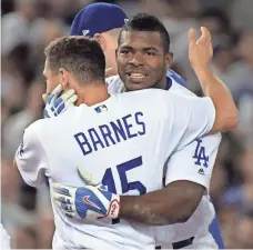  ?? KIRBY LEE, USA TODAY SPORTS ?? Yasiel Puig, right, and the Dodgers have baseball’s best record.