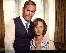  ??  ?? Above: Nadine as Jean with co-star Craig McLachlan on the DoctorBlak­e set. Right: Receiving her Best Actress AFI award for Mull, aged 17. Below: Nadine and Kylie in theirHende­rson Kids heyday.