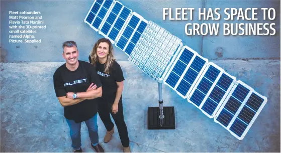  ?? ?? Fleet cofounders Matt Pearson and Flavia Tata Nardini with the 3D-printed small satellites named Alpha. Picture: Supplied