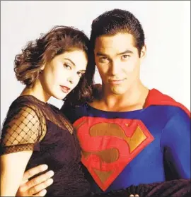  ?? Timothy White ABC ?? THE SUPERVISIN­G producer of the 1990s television series “Lois & Clark: The New Adventures of Superman” was sent a letter that was actually part of a secret-shopper scam. Above, the TV series’ stars, Teri Hatcher and Dean Cain.