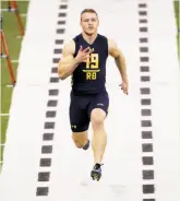  ?? David J. Phillip / Associated Press ?? Christian McCaffrey tied for fourth among running backs with a 4.48-second 40-yard dash at the NFL combine in Indianapol­is.