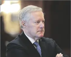  ?? AP PHOTO/JEFFREY COLLINS ?? Former White House Chief of Staff Mark Meadows listens during an announceme­nt of the creation of a new South Carolina Freedom Caucus based on a similar national group at a news conference on April 20 in Columbia, S.C.