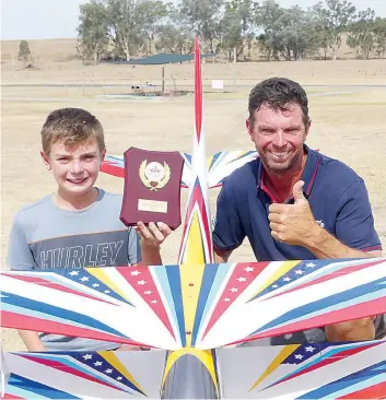  ?? ?? Seth and Chris Huntingfor­d were all smiles after Seth took out the F3A section at the Australian Precision Aerobatics Masters in Albury last month.