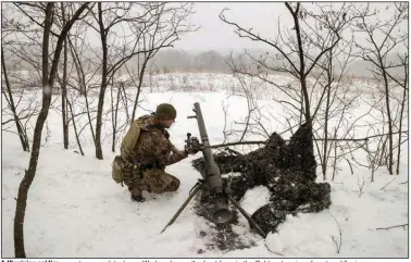  ?? (The New York Times/Tyler Hicks) ?? A Ukrainian soldier operates an anti-tank gun Wednesday on the front lines in the Bahkmut region of eastern Ukraine.