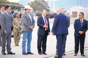  ?? ROBERTO E. ROSALES/JOURNAL ?? Rio Rancho Mayor Gregg Hull greets President Trump Monday at Kirtland Air Force Base.