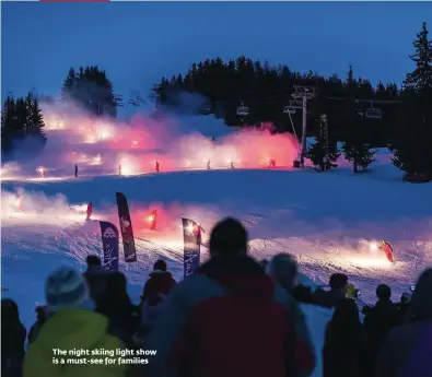  ??  ?? The night skiing light show is a must-see for families