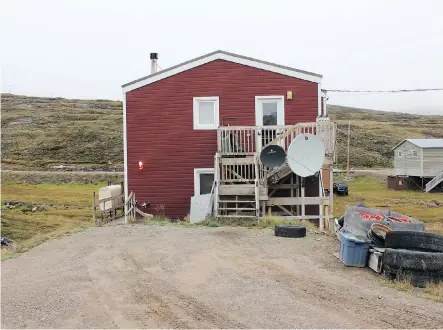  ?? EMILY JACKSON/ FILES ?? It’s common for northern houses to have multiple satellites, as seen on this home in Iqaluit.