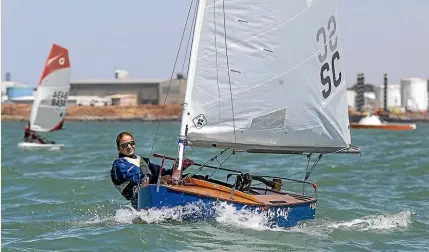  ?? DOUG FIELD/STUFF ?? Timaru’s Aylwen Berger won the P class event at the Timaru Yacht and Powerboat Club’s annual age-group regatta at Caroline Bay at the weekend. Members of the Berger family also finished second and third.