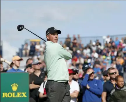  ?? ALASTAIR GRANT — THE ASSOCIATED PRESS ?? Matt Kuchar plays off the 15th tee during the first round of the British Open at Royal Birkdale in Southport, England on Thursday.