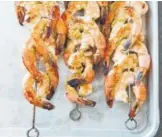  ??  ?? Grilled Jalapeño and Lime Shrimp Skewers. Joe Keller, America's Test Kitchen