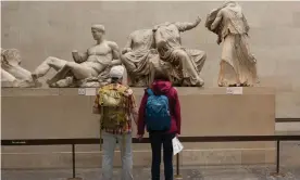  ?? Photograph: Richard Baker/In Pictures/Getty Images ?? British Museum visitors look at the Parthenon marbles. Boris Johnson previously ruled out returning them to Greece on the grounds they were acquired legally.