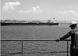  ?? EDGAR SU • REUTERS FILE ?? Crude oil tanker Maran Cassiopeia is pictured in the waters off Tuas in Singapore July 15, 2019.