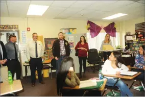  ?? RECORDER PHOTO BY JAMIE A. HUNT ?? From left: Eric Gonzales, Principal Dennis Doane, Assemblyma­n Devon Mathis, Field Representa­tive Rachael Ray, Kelley Layton visit a classroom at J.J. Cairns Continuati­on High School in Lindsay on Friday, March 22. Mathis was learning about the award-winning internship program at the school.