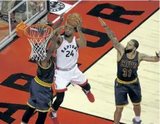  ?? JACK BOLAND/TORONTO SUN ?? Toronto’s Norman Powell shoots against the Cleveland Cavaliers last season. Powell has agreed to a four-year, US$42-million extension with the Raptors.