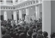  ??  ?? Mourners gather before the coffin containing the remains of Bolivia’s Deputy Minister of Internal Affairs Rodolfo Illanes during Friday’s Mass inside the government palace.