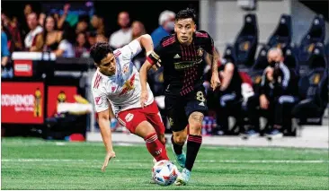  ?? ATLANTA UNITED ?? Atlanta United midfielder Ezequiel Barco dribbles the ball at Mercedes-benz Stadium on Sunday. United has scored just 11 goals in its past 10 games and was shut out in consecutiv­e games for the first time this season.