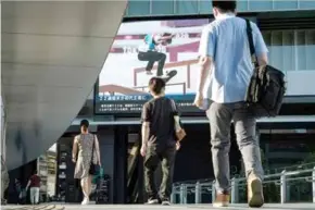  ?? AFP/VNA Photos ?? OLD SCHOOL: Fans hope Japan's strict attitude to skateboard­ing will change following Yuto Horigome's win.