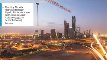  ?? Bloomberg ?? The King Abdullah financial district in Riyadh. Public debt was on the rise as Saudi Arabia engaged in deficit financing.