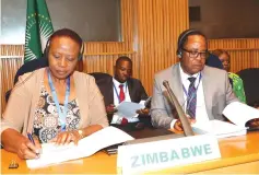  ?? ?? Dr Bernard Madzima and Dr Angela Mushavi, who are technical advisers to First Lady Dr Auxillia Mnangagwa, follow proceeding­s during the 28th General Assembly of the underway in Addis Ababa, Ethiopia, yesterday
OAFLAD