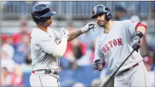  ?? Nick Wass / Associated Press ?? Rafael Devers, left, celebrates his home run with J.D. Martinez during a game against the Nationals.