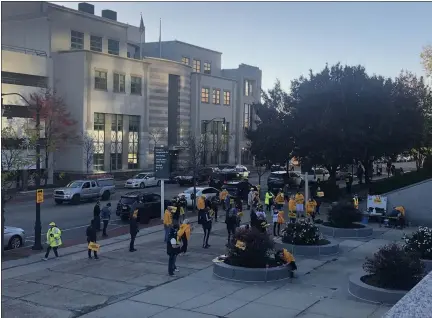  ?? RACHEL RAVINA — MEDIANEWS GROUP ?? People gather outside the Montgomery County Courthouse on Wednesday afternoon as part of a “Count Every Vote” rally.