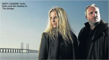  ??  ?? DIRTY LAUNDRY: Sofia Helin and Kim Bodnia in ’The Bridge’