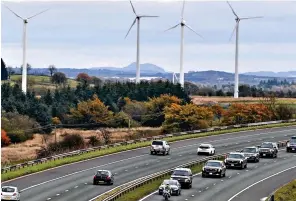  ?? ?? ... and passing wind turbines on its way to the Glasgow conference