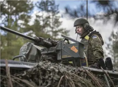  ?? DMITRI BELIAKOV/THE WASHINGTON POST ?? Canada is sending about 450 soldiers as well as a number of armoured vehicles and other necessary equipment to Latvia.