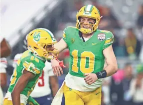  ?? MARK J. REBILAS/USA TODAY SPORTS ?? In five seasons combined with Auburn and Oregon, quarterbac­k Bo Nix threw for 113 touchdowns, including 74 with Oregon.