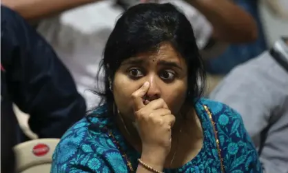  ??  ?? An ISRO employee reacts after the communicat­ion and data were lost from the Vikram Lander. Photograph: Jagadeesh Nv/EPA