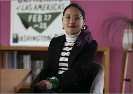  ?? EDUARDO VERDUGO — THE ASSOCIATED PRESS ?? Activist Cinthya Ramirez poses for a photo in the office of Catholics for the Right to Decide in Mexico City on Dec. 4. “You might think that one cannot be a feminist and a Catholic,” said Ramirez. “But being women of faith does not mean that we oppose progressiv­ity, human rights or sexual diversity.”