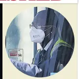  ??  ?? PROTECTION Bus driver with face mask
