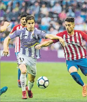  ?? FOTO: EFE ?? Hervías conduce el balón en el partido ante el Sporting de Gijón