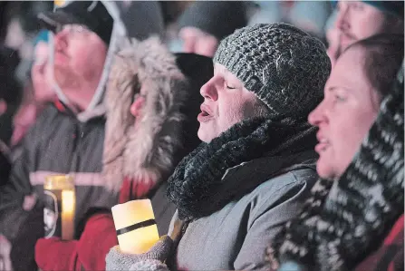  ?? PHOTOS BY JOHN RENNISON THE HAMILTON SPECTATOR ?? Lisa Revell sings along to the performanc­es during the tribute concert.