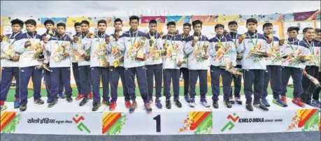  ?? HT PHOTO ?? The victorious Odisha hockey team after its dominant display against Punjab in the Khelo India School Games, in New Delhi on Thursday.