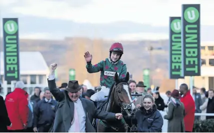  ?? Picture: David Davies/PA ?? Jockey Brian Hughes celebrates after winning the Close Brothers Novices’ Handicap Chase aboard Mister Whitaker at this year’s Cheltenham Festival in March