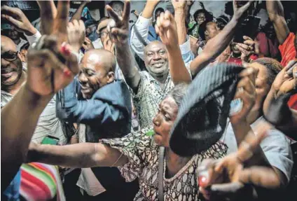  ??  ?? Song and dance: Supporters of presidenti­al candidate Felix Tshisekedi welcome the announceme­nt of the provisiona­l results of the presidenti­al election. Photo: Caroline Thirion/afp