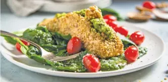  ?? CALIFORNIA WALNUTS ?? Walnut-crusted pesto salmon takes only 10 minutes to prepare and 15 minutes to cook.